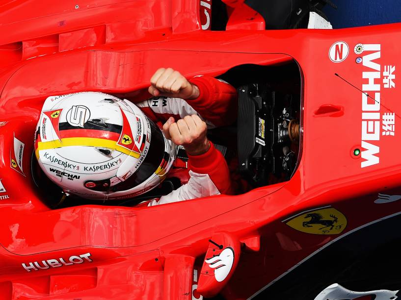 O alemão Sebastian Vettel comemora vitória pela Ferrari no GP da Malásia - 29/03/2015