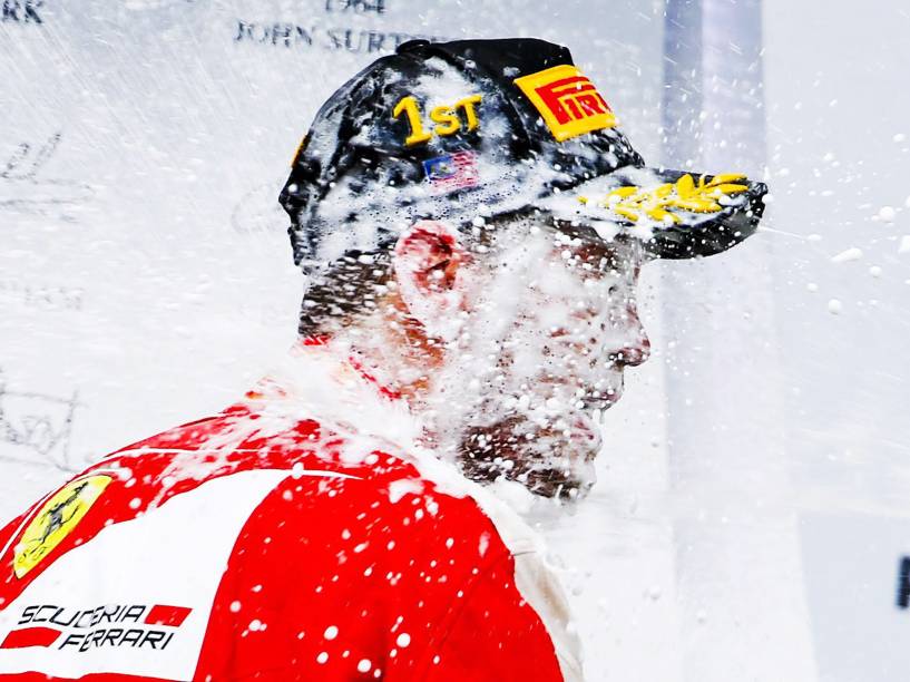 O alemão Sebastian Vettel comemora vitória pela Ferrari no GP da Malásia - 29/03/2015