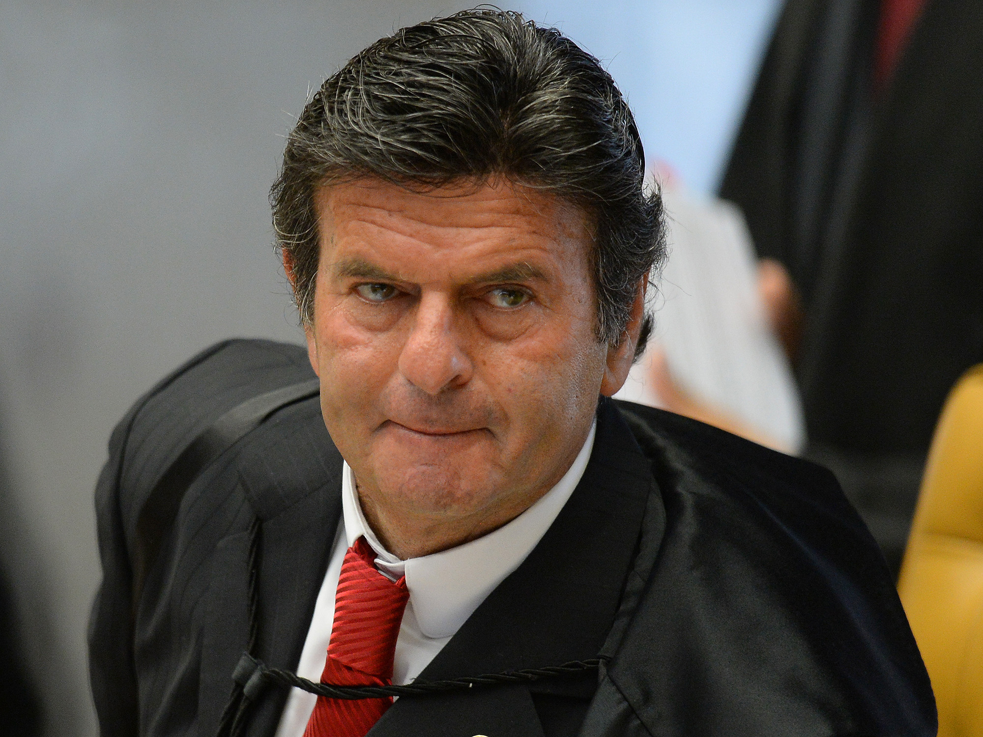 O ministro do STF (Supremo Tribunal Federal), Luiz Fux, durante a sessão desta quinta-feira (31) que decidirá se as investigações contra o ex-presidente Lula ficarão no STF ou se voltarão à Curitiba, para o juiz Sérgio Moro