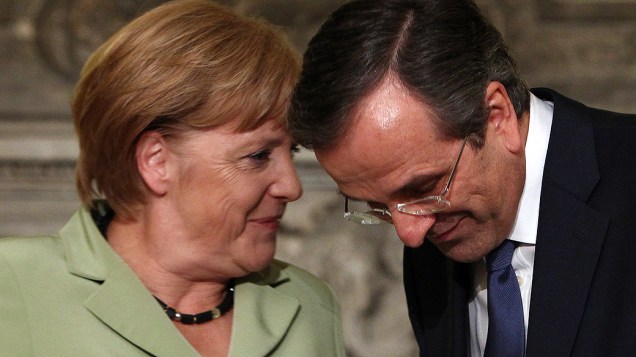 Angela Merkel fala com premiê grego, Antonis Samaras, após ser recebida em Atenas