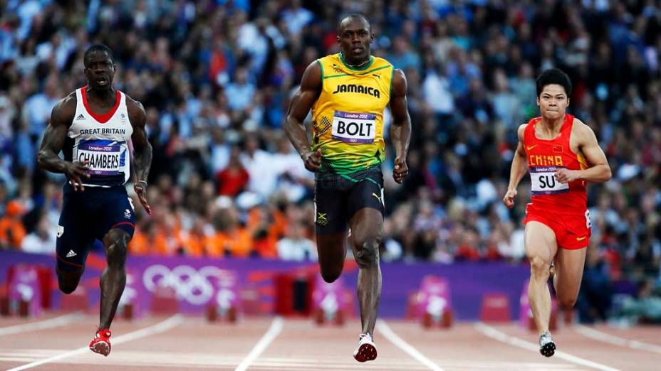 O britânico Dwain Chambers, o jamaicano Usain Bolt e o chinês Su Bingtian durante prova semi-final dos 100m nas Olimpíadas de Londres, em 05/08/2012