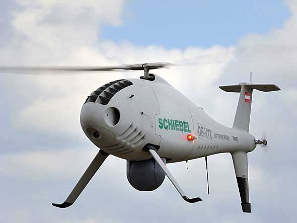 O Camcopter S-100, da austríaca Schiebel, é a única aeronave não tripulada aceita para voos de demonstração em Paris. Pode ser usado tanto em missões militares de reconhecimento como em filmagens aéreas civis