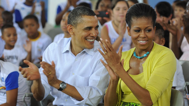 O presidente Barack Obama e a primeira-dama, Michelle, durante visita à Cidade de Deus, no Rio