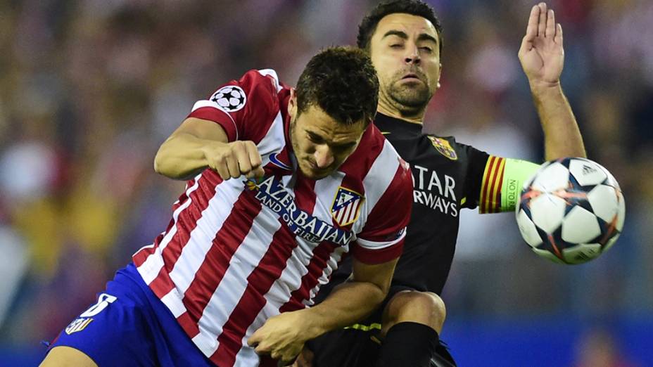 Lance da partida entre Atlético de Madri e Barcelona, no estádio Vicente Calderón