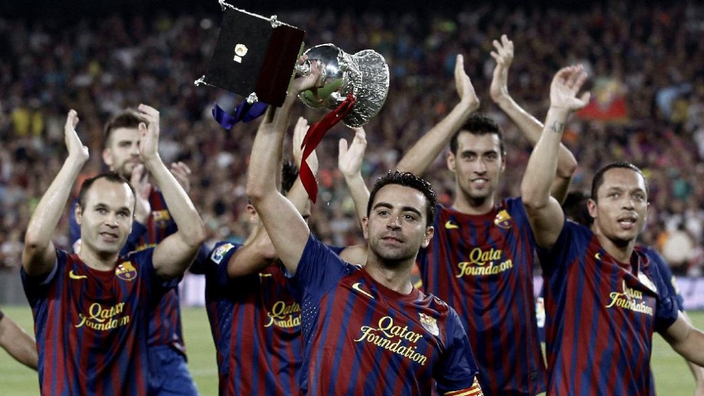 Jogadores do Barcelona comemoram o título da Supercopa da Espanha