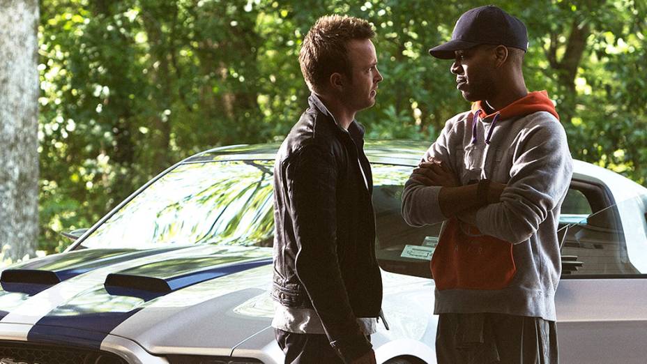 Os atores Aaron Paul e Scott Mescudi no filme Need for Speed