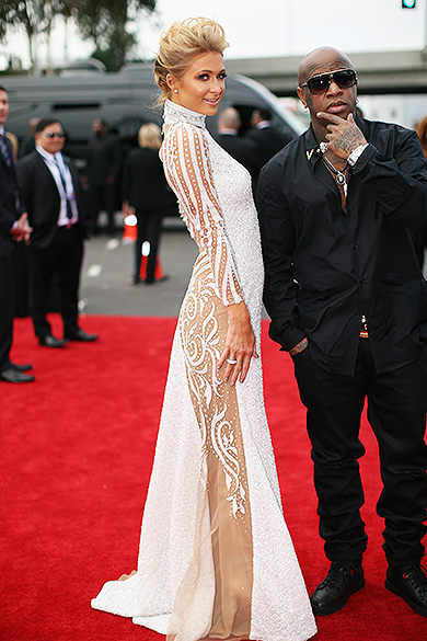 Paris Hilton com o rapper Birdman na chegada para a premiação do Grammy 2014, em Los Angeles