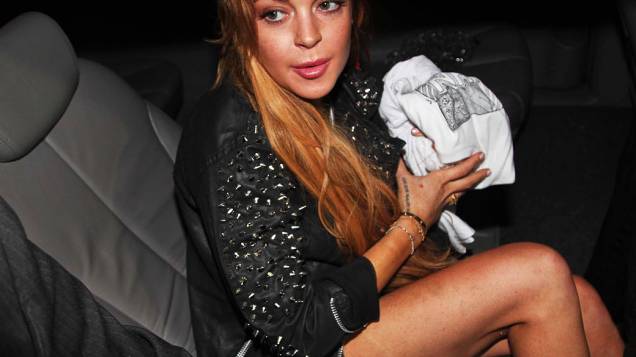 Lindsay Lohan chega em coquetel da John John em São Paulo