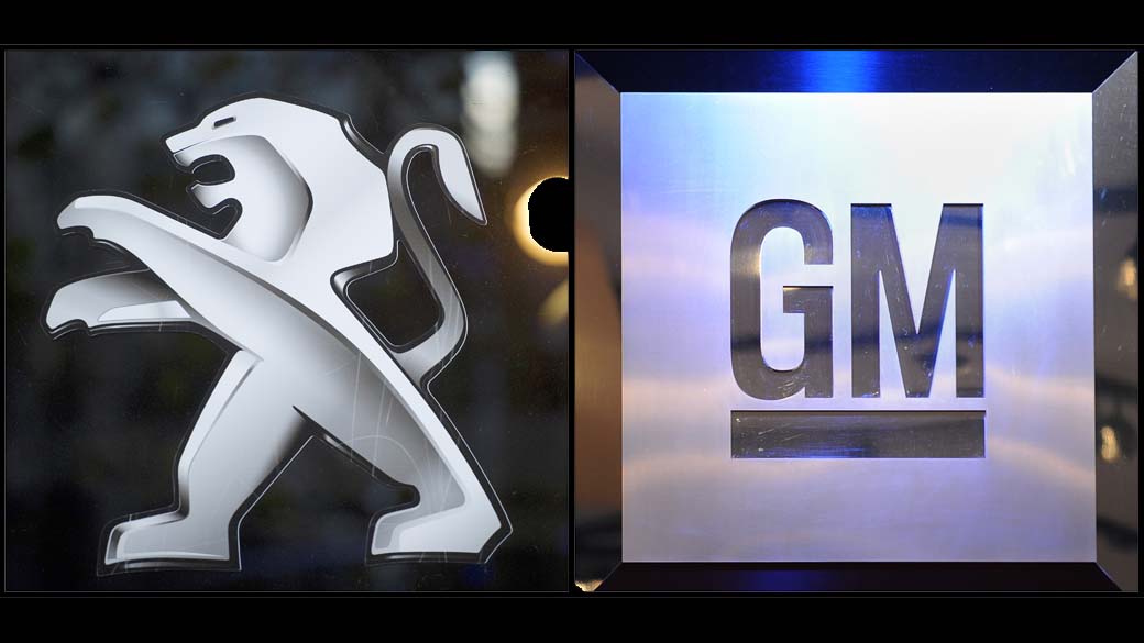 Logos da PSA Peugeot Citroen e General Motors