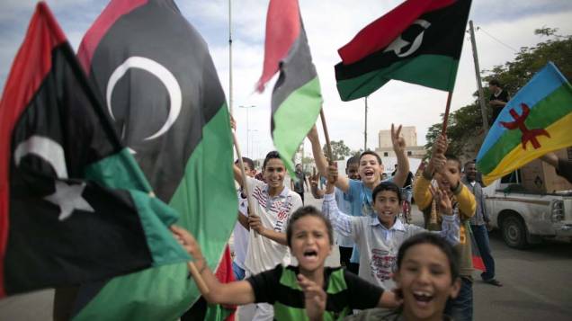 Comemorações nas ruas de Trípoli, após a notícia da captura e morte de Kadafi