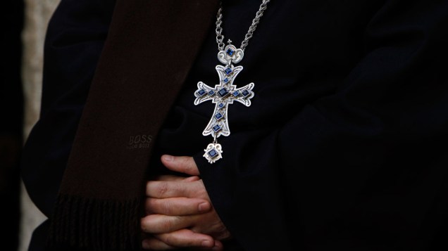 Clérigo durante cerimônia religiosa de Natal, em Jerusalem - 24/12/2011