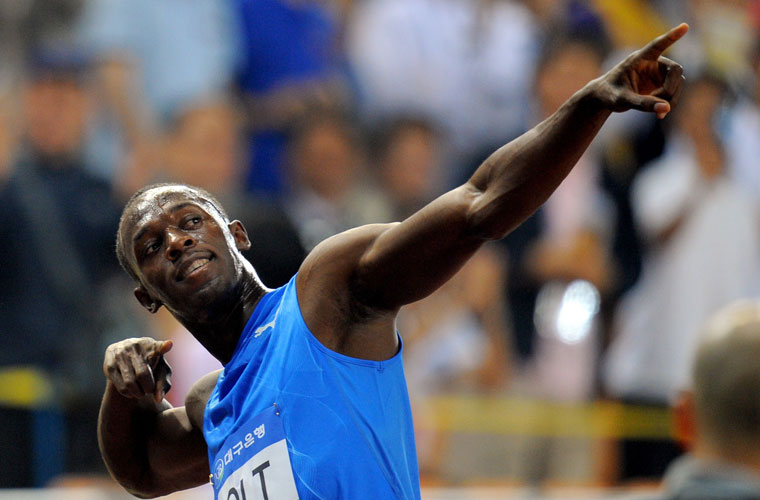 O corredor jamaicano Usain Bolt comemora a vitória dos 100 metros rasos na sua primeira competição internacional do ano, no Meeting de Daegu (Coreia do Sul), com o tempo de 9s86.