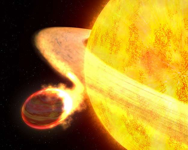 Imagem divulgada pela Nasa mostra uma estrela semelhante ao sol que está �engolindo� o planeta WASP-12b. Ainda levará cerca de dez bilhões de anos para que o planeta seja completamente extinto.