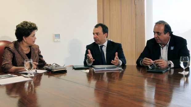 A presidente Dilma Rousseff, o governador do Rio de Janeiro, Sérgio Cabral, e o vice-governador Luiz Fernando Pezão: parceria ameaçada em 2014