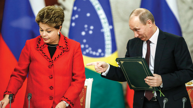 Qualquer negócio: Dilma e Putin no encontro em Moscou, em dezembro de 2012: trocando armas por carne