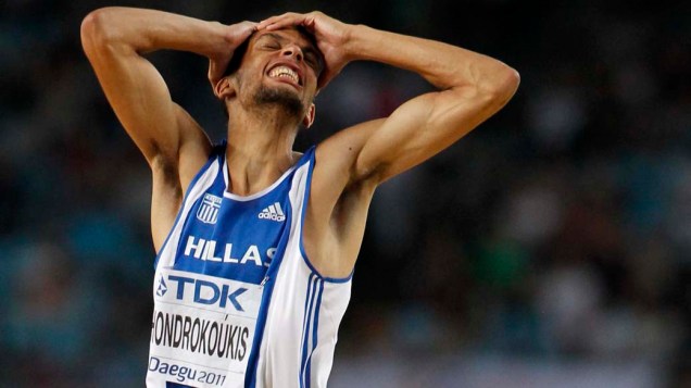 O grego Dimitrios Chondrokoukis após a prova de salto em altura no Mundial de Atletismo em Daegu, Coreia do Sul