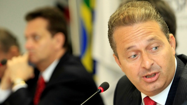 O governador de Pernambuco e presidente nacional do PSB, Eduardo Campos, em evento na Associação Comercial de São Paulo. Ao fundo, o prefeito de São Paulo, Gilberto Kassab