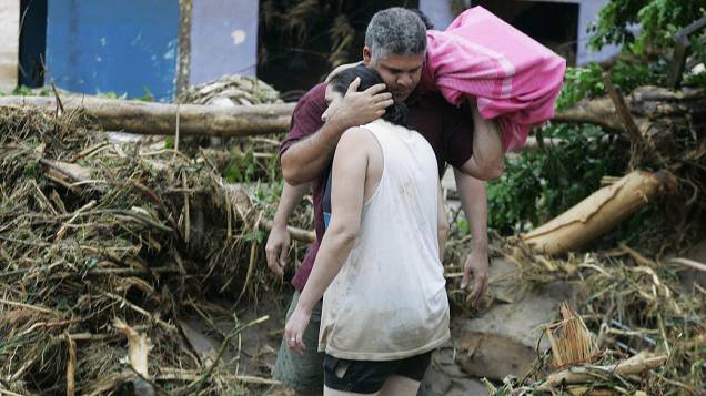 Chuva alagou cidades da região e deixou um morto Xerém, área de Duque de Caxias (RJ) Chuva alagou cidades da região e deixou um morto Xerém, área de Duque de Caxias (RJ)
