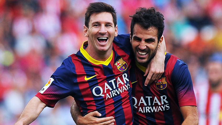 Messi e Fabregas durante jogo entre Almería e Barcelona pelo Campeonato Espanhol