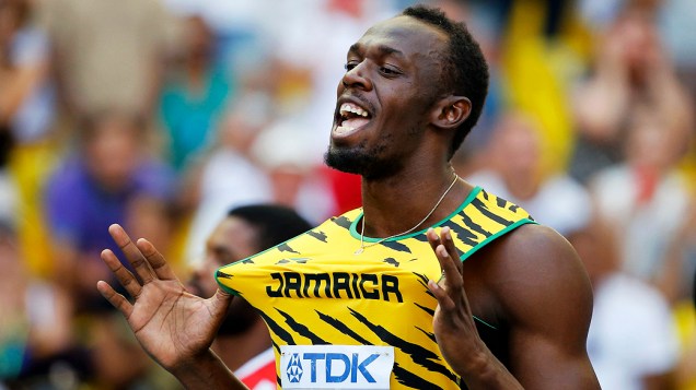 Usain Bolt vence a a semi-final de 100 metros do 14 º Campeonato Mundial de Atletismo, em Moscou, Rússia