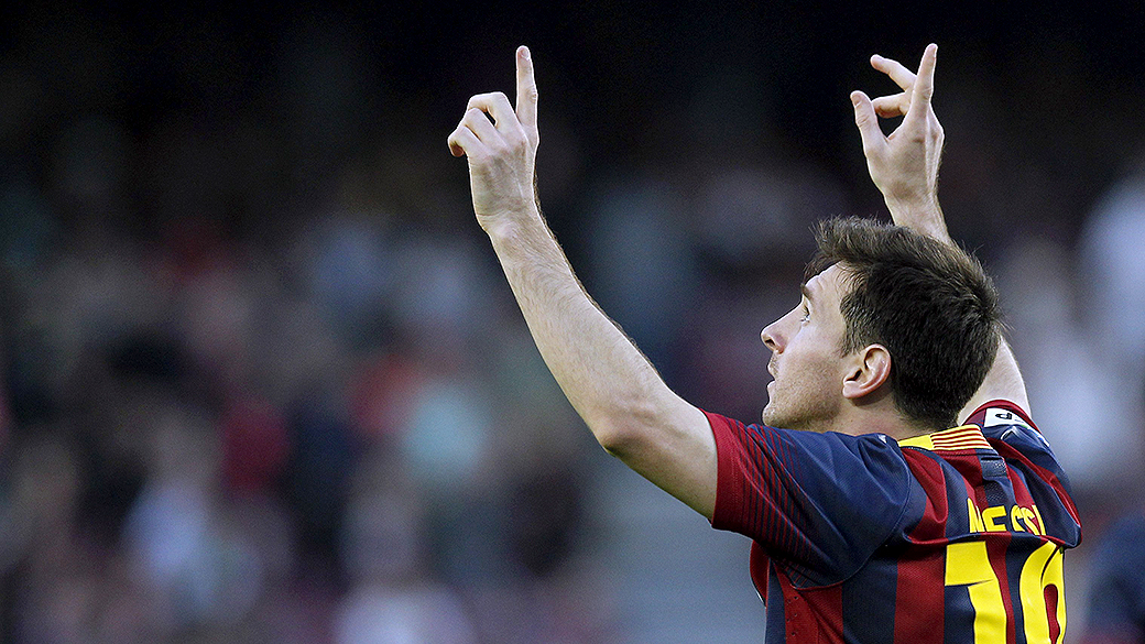Messi comemora o seu 371º gol da carreira no jogo contra o Osasuna, em Barcelona