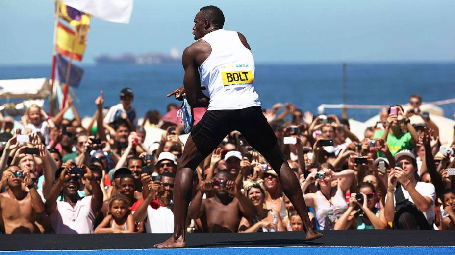 Usain Bolt durante desafio de 150 metros em Copacabana, Rio de Janeiro