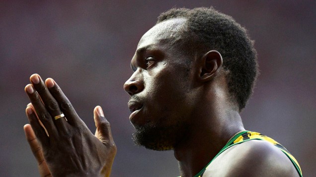 Usain Bolt, vence a prova dos 100 metros em sua estreia no Campeonato Mundial de Atletismo, no estádio Luzhniki, em Moscou