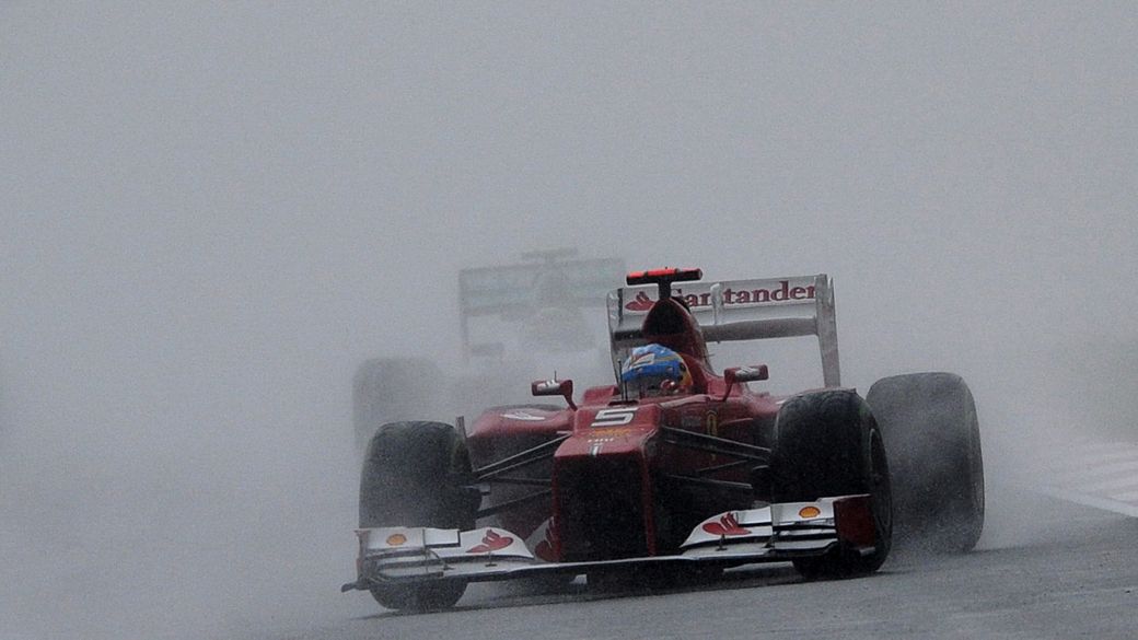 O espanhol Fernando Alonso, da Ferrari, vencedor do GP da Malásia, disputado sob forte chuva neste domingo, no circuito de Sepang, em Kuala Lumpur
