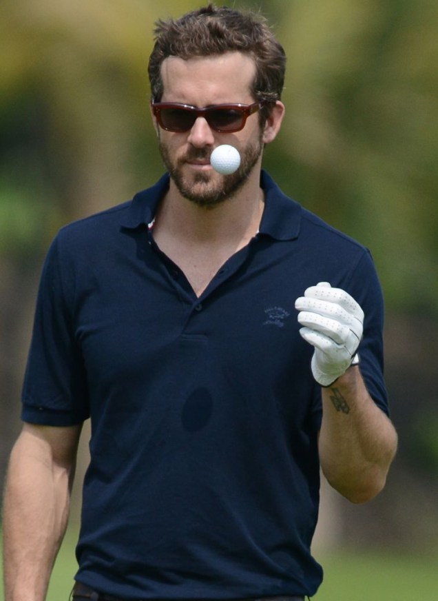 O ator Ryan Reynolds no torneio de golfe das celebridades em Haikou, na China, nesta sexta-feira