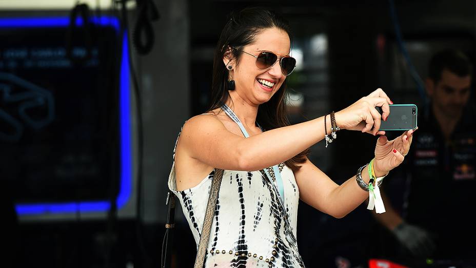 As mulheres no GP do Brasil no Autódromo de Interlagos em São Paulo, nas arquibancadas e nos boxes