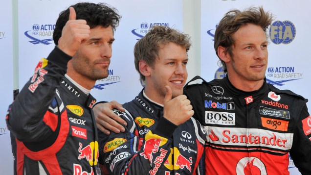 Mark Webber (terceiro lugar), Sebastian Vettel (pole position) e Jenson Button (segundo lugar) após o treino classificatório do GP de Mônaco