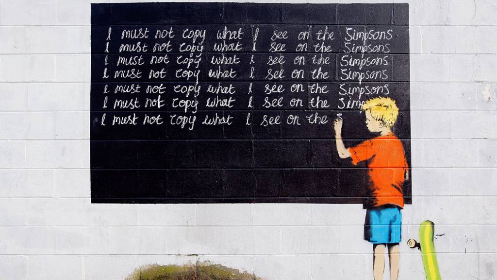 Grafite de Banksy, possivelmente Robert Del Naja, em Nova Orleans, nos Estados Unidos