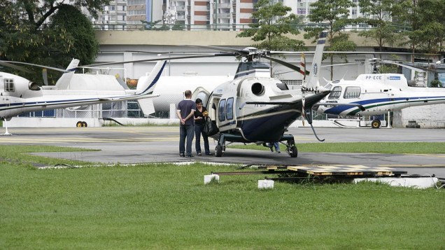 28 de junho - 11h29: A primeira-dama embarca no helicóptero
