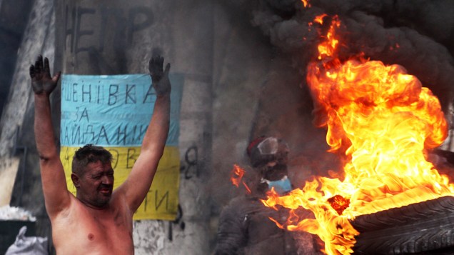 Manifestante pró-Europa se aquece durante confrontos em Kiev, na Ucrânia