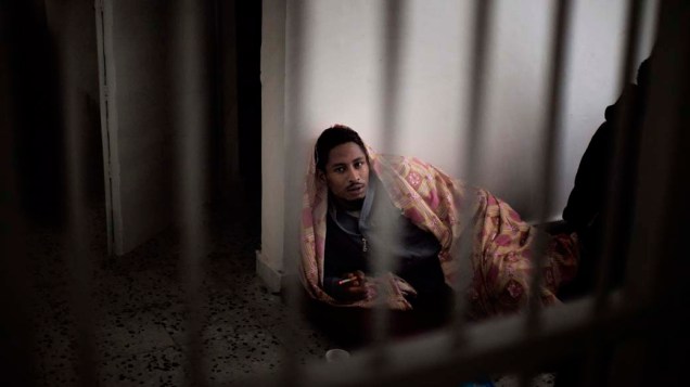Imigrante na prisão Deida em Trípoli, Líbia