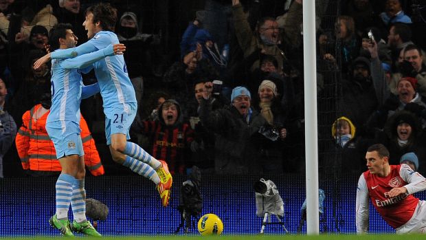 Jogadores do Manchester City comemoram vitória sobre Arsenal