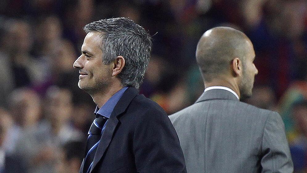 Os técnicos do Real, José Mourinho, e do Barcelona, Guardiola: estilos opostos