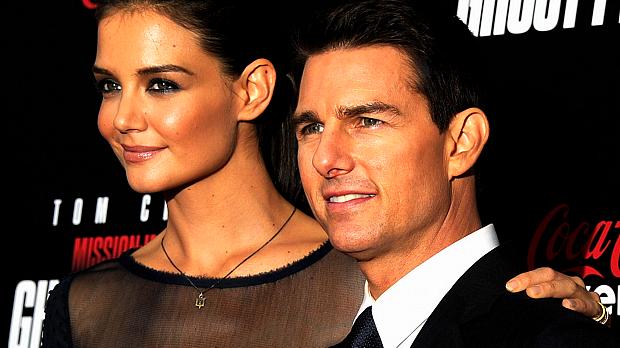 Katie Holmes e Tom Cruise divulgando o novo filme dele: 'Missão Impossível 4'