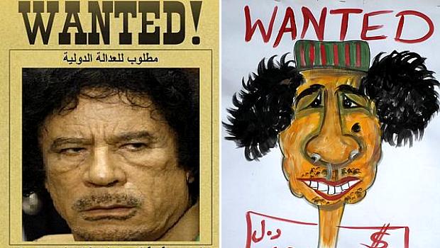 Líbia: rebeldes espalharam cartazes com fotos e ilustrações do ex-ditador como 'procurado'