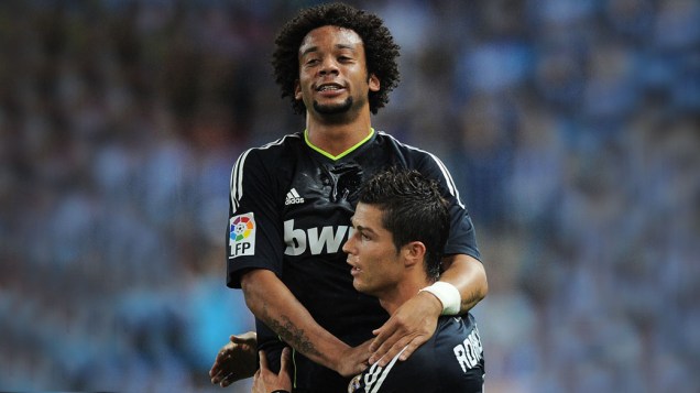Cristiano Ronaldo e Marcelo comemoram gol em partida contra o Málaga válida pelo campeonato espanhol