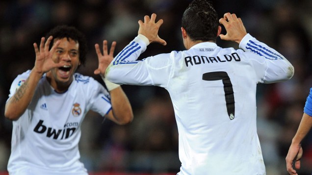 Cristiano Ronaldo e Marcelo durante partida contra o Getafe, válida pelo campeonato espanhol Cristiano Ronaldo e Marcelo durante partida contra o Getafe, válida pelo campeonato espanhol