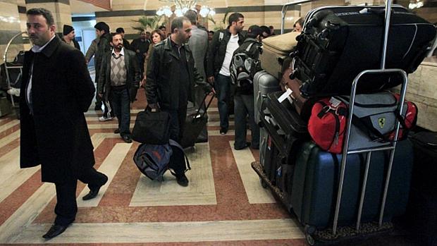 Monitores de países do Golfo deixam hotel em Damasco