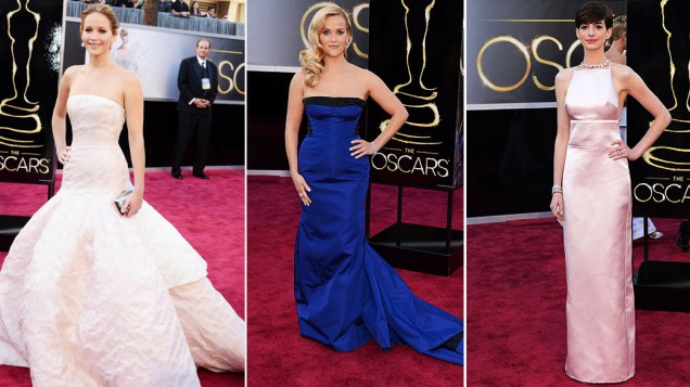 Jennifer Lawrence, Reese Witherspoon e Anne Hathaway desfilam no tapete vermelho durante a cerimônia do Oscar 2013. As três foram eleitas as mais bem vestidas por espectadores americanos do canal TNT