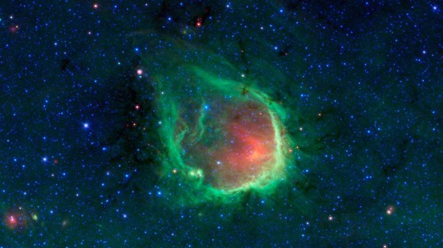 Em foto divulgada pela Nasa hoje, nebulosa de esmeralda é vista através do telescópio Spitzer