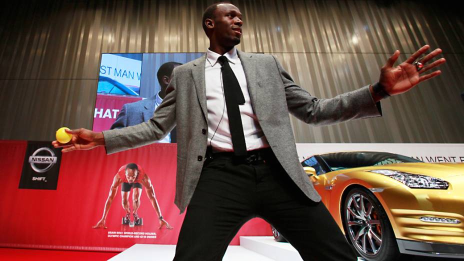 Medalhista de ouro olímpico jamaicano Usain Bolt durante evento na sede da Nissan Motor Co, em Yokohama