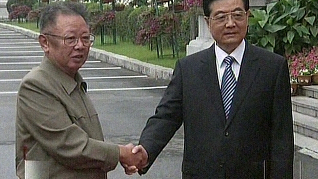 O mandatário norte-coreano, Kim Jong-Il, e o presidente chinês, Hu Jintao