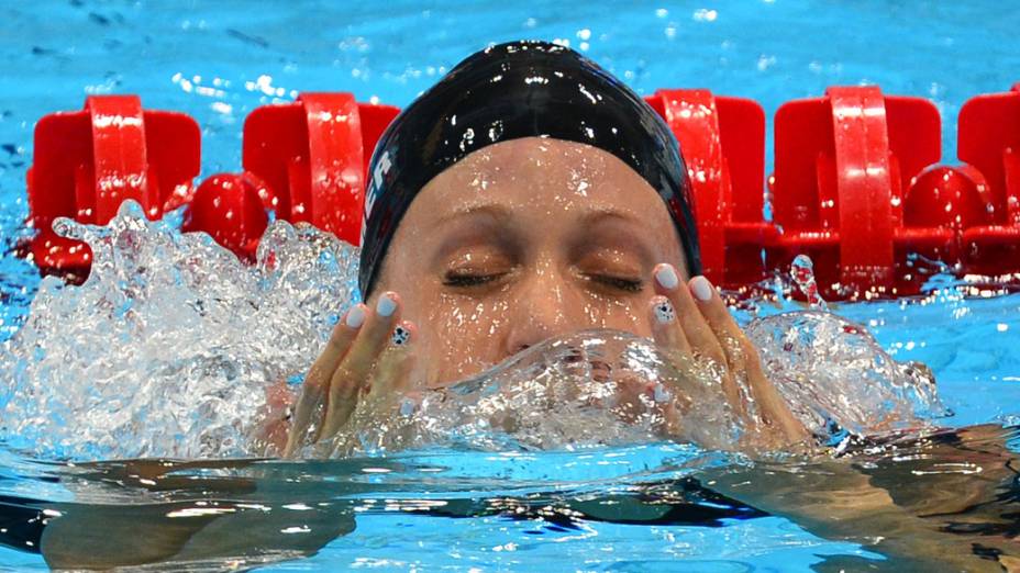 Com direito a recorde mundial, a americana Dana Vollmer conquistou neste domingo a medalha de ouro nos 100 metros borboleta , em 29/07/2012