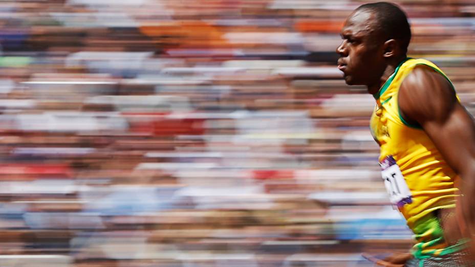 Jamaicano Usain Bolt durante eliminatórias dos 100m rasos nos Jogos Olímpicos de Londres 2012<br>   