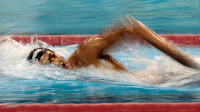 O tunisiano Oussama Mellouli na prova dos 1500m nado livre masculino durante os Jogos Árabes em Doha, nos Emirados Árabes