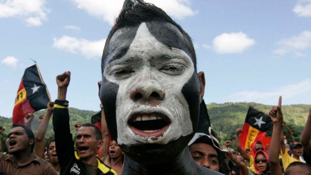 Partidário de candidato a presidencia do Timor-Leste participa de comício na capital Dili